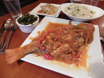 Haitian style whole red snapper, pan seared with sweet red peppers, onions and a light tomato sauce.