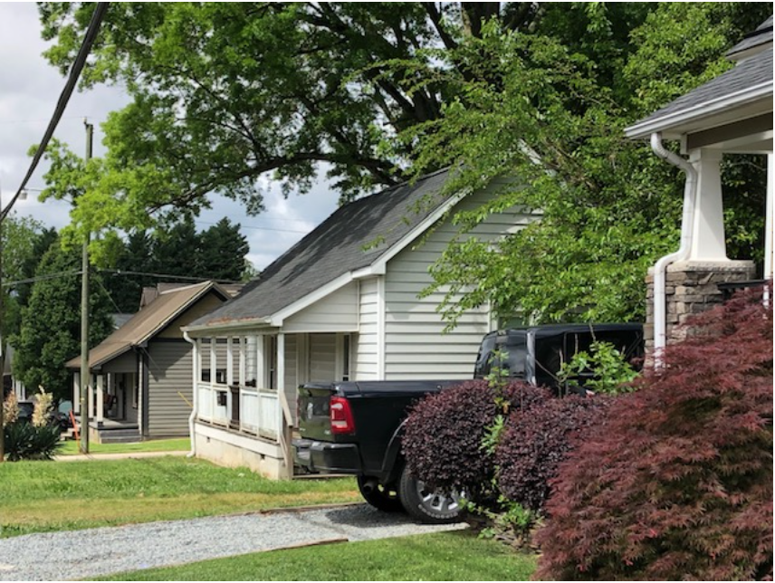 More of Stuart Cramer's cottages built for workers at the Highland Park #3 mill make up all of Yadkin Avenue. You’ll enjoy observing the many ways these look-alike houses have transformed over a century-plus.