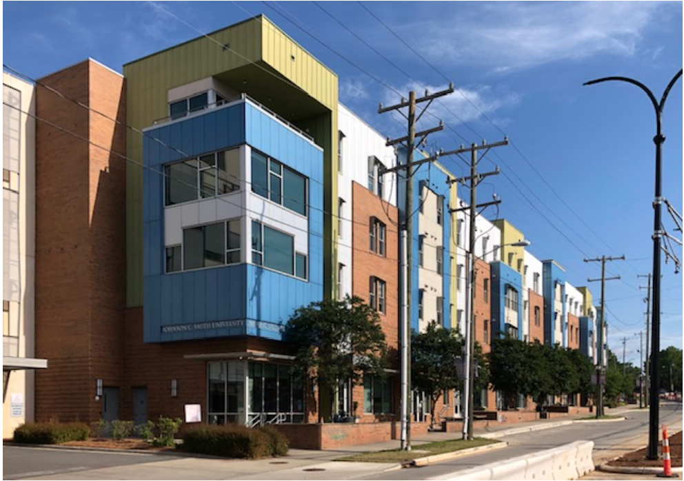 The rhythms of jazz, the collage art of Charlotte’s renowned Romare Bearden – architect Darrel Williams (Neighboring Concepts) had those inspirations in mind when he designed this 2012 mixed-use project. A partnership between JCSU, Mecklenburg County and Beatties Ford Road’s longtime Griffin family, it provides student housing for JCSU and nearby Johnson & Wales University.