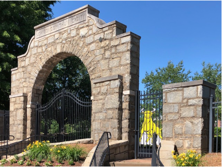 Biddle Institute started right after the Civil War to train “teachers and preachers” – leaders among the newly freed African American population of the South. Its success attracted the Johnson C. Smith family as funders and the college was renamed in their honor in 1923, the year this stone gateway was built. In the photo, can you glimpse the bright yellow cut-out? It’s the Golden Bull, JCSU’s mascot, placed as part of the University’s 150th birthday celebration in 2017.