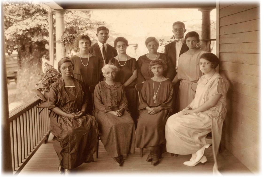 Elizabeth Smalls Bampfield surrounded by family on the porch on Mill Road, courtesy of historian Michael Turner Webb.