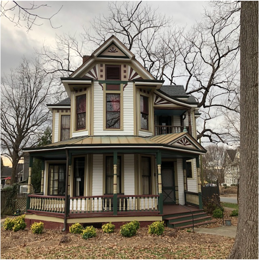 This eye-catching house, one of the few well-preserved Victorians left in Charlotte, was built in 1894 by carpenter J.N. Mallonee who had just come from Charleston to Charlotte to launch a contracting business. Think of it as a giant business card. 

After a couple of years living way out here in the ‘burbs, Mallonee sold it to grocer C.W. Jones and moved into town.